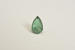 A COLOUR CHANGE ALEXANDRITE, pear cut measuring approximately 7mm x 4mm, weighing 0.45ct, daylight
