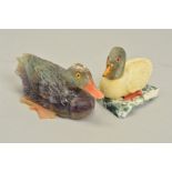 TWO HAND CARVED DUCK ORNAMENTS, the small duck comprised of various materials such as quartz sat