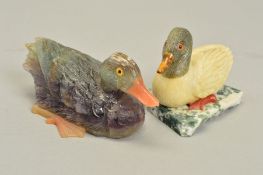 TWO HAND CARVED DUCK ORNAMENTS, the small duck comprised of various materials such as quartz sat