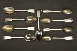 A SET OF NINE VICTORIAN IRISH SILVER FIDDLE PATTERN TEASPOONS, engraved with a griffin head crest,