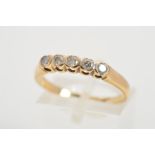 A 9CT GOLD FIVE STONE DIAMOND RING, designed as a row of five brilliant cut diamonds within part