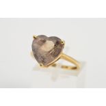 A 9CT GOLD SMOKY QUARTZ RING, claw set with a heart shape smoky quartz with 9ct hallmark for