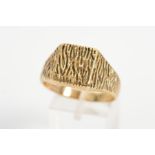 A LATE 20TH CENTURY 9CT GOLD BARK FINISH SIGNET RING, approximate gross weight 8.6 grams