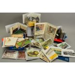 A LARGE COLLECTION OF POSTCARDS/PHOTOGRAPHS, in sixteen albums, one box and loose (several