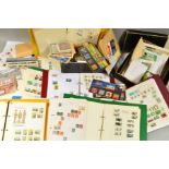 AN ALL WORLD ACCUMULATION OF STAMPS, in eight albums and loose with Great Britain