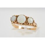 A 9CT GOLD THREE STONE OPAL RING, designed as three graduated circular opals, scrolling detail to