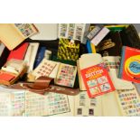 AN ACCUMULATION OF STAMPS AND COVERS, in albums and loose with Great British commemorative sets (box
