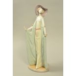 A TALL LLADRO FIGURINE, 'Afternoon Tea' No 1428, designed by Jose Puche, height 36cm