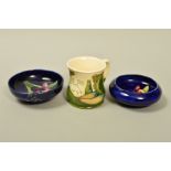 THREE PIECES OF MOORCROFT POTTERY, to include a Collectors Day Mug 1991' and two small bowls,