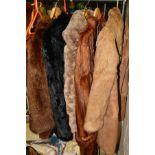 A LIGHT BROWN CONEY FUR JACKET, a black coney fur jacket, a long dyed marmot fur coat (stiff) and