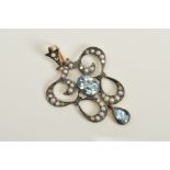A TOPAZ, SPLIT PEARL AND DIAMOND PENDANT, of openwork scrolling design set with brilliant and single