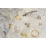A SELECTION OF GOLD JEWELLERY FINDINGS, to include white gold collet settings of varying sizes,
