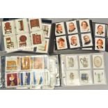 ONE CIGARETTE CARD ALBUM, containing twelve sets of 'Large' Will's cigarette cards comprising Famous