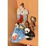 A SMALL GROUP OF FIGURES, to include a USSR figure group of young men and women holding hands,