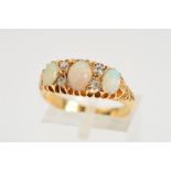 AN EDWARDIAN 18CT GOLD OPAL AND DIAMOND RING, designed as three graduated oval opal cabochons