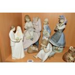 FOUR LLADRO FIGURES/GROUP to include 'Nothing To Do' No5649, 'budding Blossoms' No1416, height