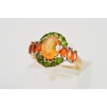 A 9CT GOLD MULTI-GEM RING, designed as a central oval yellow gem assessed as coated quartz with