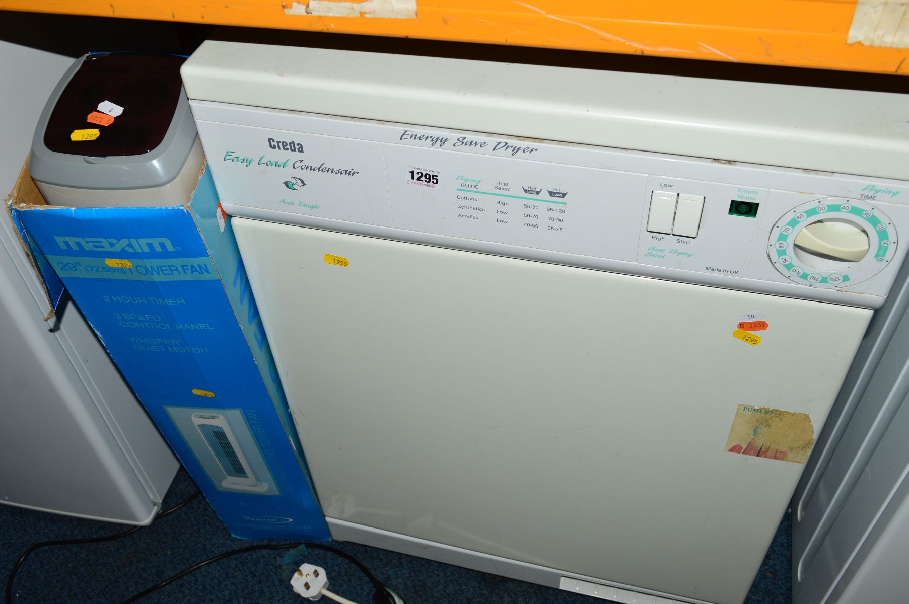 A CREDA CONDENSER DRYER together with a tower fan (2)