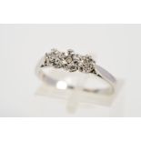 A 9CT WHITE GOLD THREE STONE DIAMOND RING, designed as three brilliant cut diamonds each within