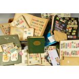 TWO BOXES OF A COLLECTION OF STAMPS AND POSTCARDS, in various albums and loose