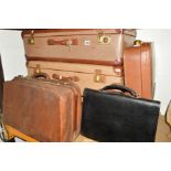 A COLLECTION OF VARIOUS LUGGAGE to include three suitcases, a brown leather Gladstone bag and four