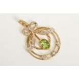 A 9CT GOLD PERIDOT AND DIAMOND PENDANT, of circular openwork design set with central oval peridot,