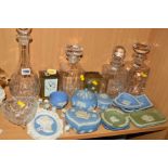 A GROUP OF CUT GLASS, WEDGWOOD JASPERWARE, CLOCKS, etc, to include decanters, brass carriage