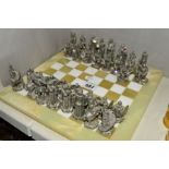 A MODERN PEWTER CHESS SET OF ARTHURIAN LEGEND CHARACTERS, SAXONS AND CELTS, each with a coloured