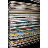 A COLLECTION OF OVER EIGHTY LP'S AND 12' SINGLES, including Jack Jones, John Lennon, Jeff Lyne,