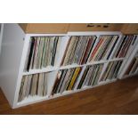 A WHITE PAINTED CUBE BOOKCASE, with eight apertures 147 long x77 high x 77cm deep