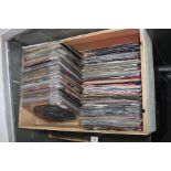 A WOODEN BOX CONTAINING OVER ONE HUNDRED AND FIFTY 7' SINGLES AND PICTURE DISCS, by artists such