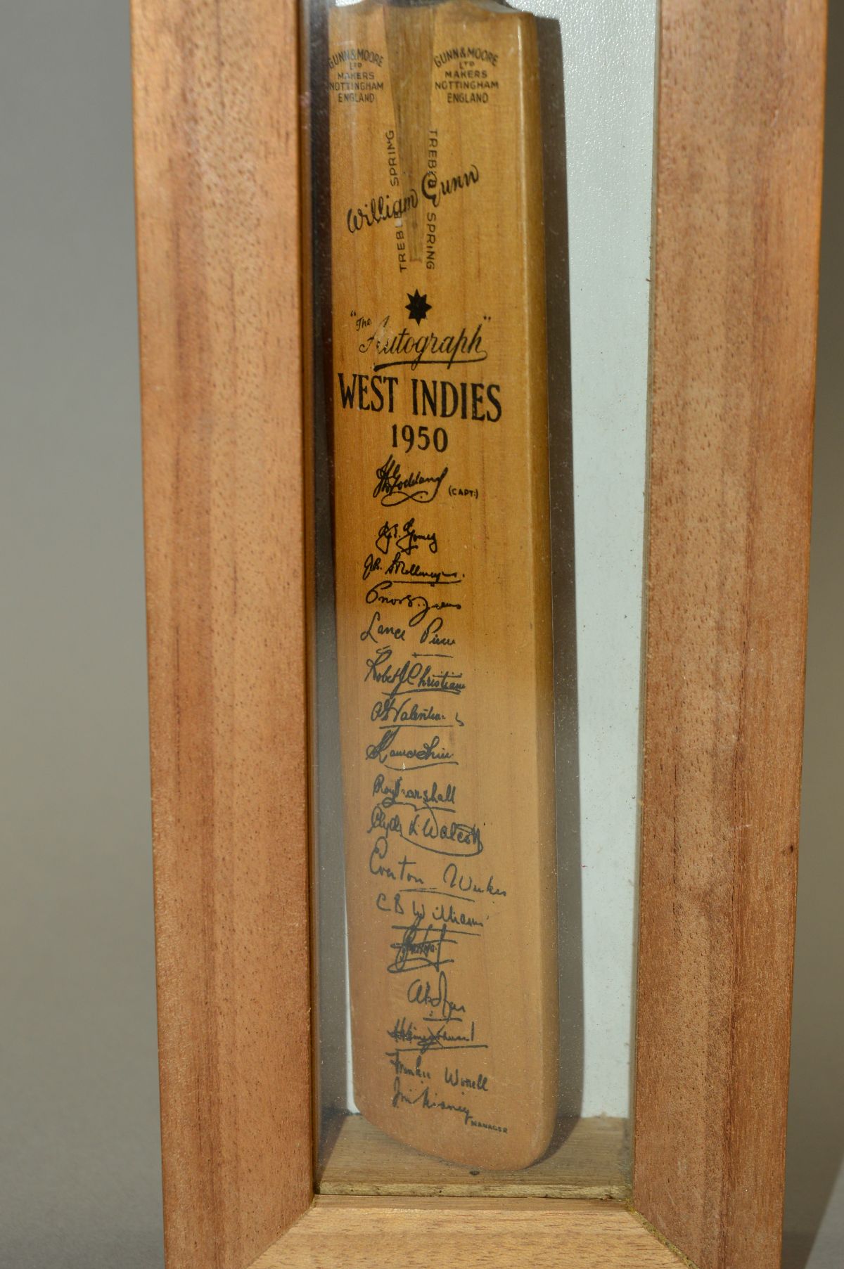 MINIATURE SIGNED CRICKET BATS, housed in individual wood and glass cases, teams are Australia and - Image 3 of 4