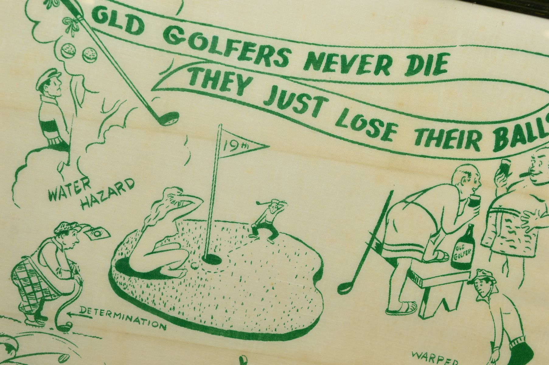FRAMED GREEN AND WHITE LINEN WITH CARICATURES OF GOLFING SCENES, and captioned 'Old Golfers never - Image 2 of 2