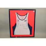 FRAMED WHITE VEST WITH BLUE SIDES AND RED ARM PIPING AS WORN BY COLIN JACKSON WHEN WINNING THE 110