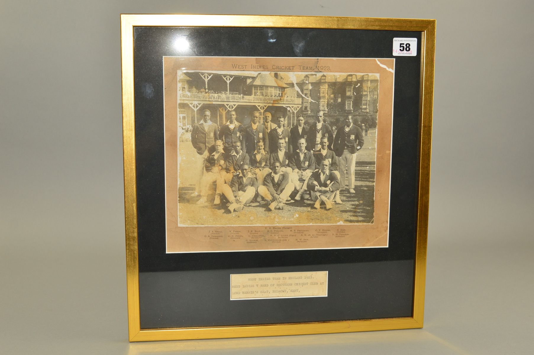 FRAMED 1923 WEST INDIES TOURING TEAM PHOTOGRAPH, taken at Lord Harris's Seat Belmont, Kent on the