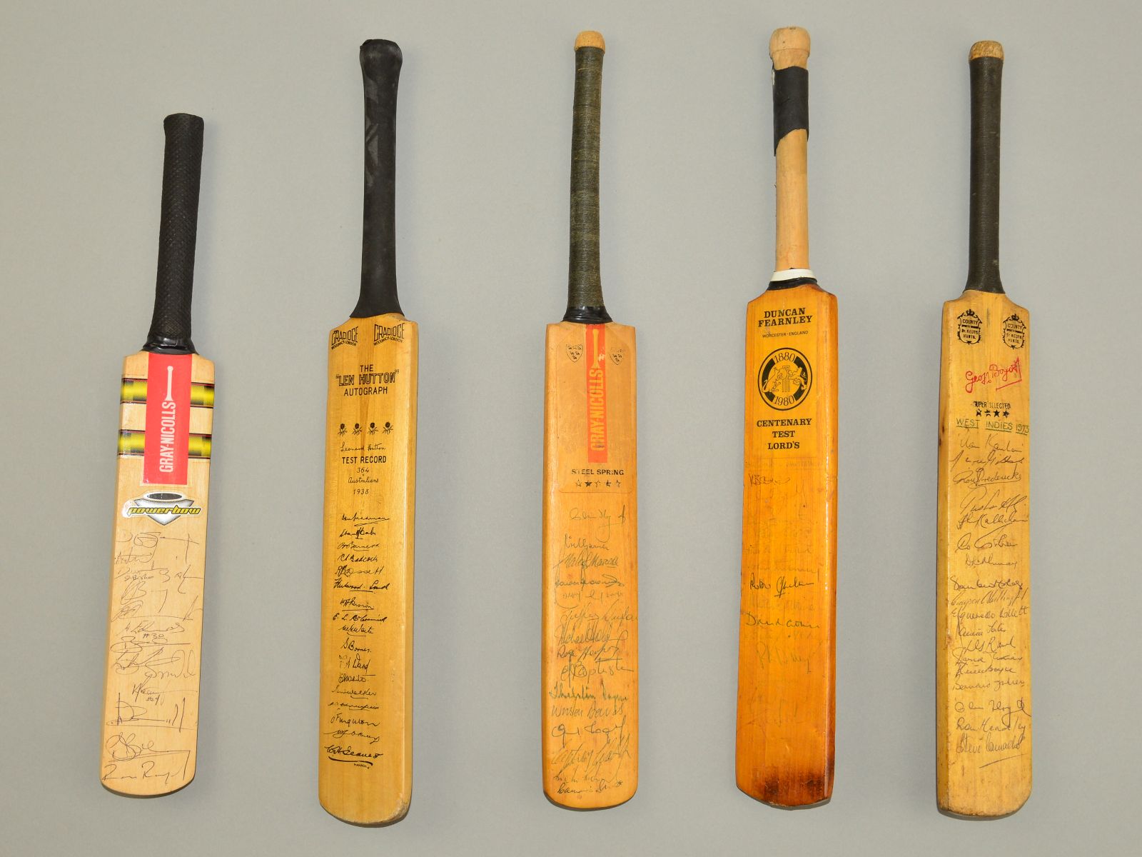 AUTOGRAPHED CRICKET BATS, of the Australian, West Indian and New Zealand touring teams to England,