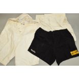 THREE PAIRS OF WHITE RUGBY SHORTS, from Lillywhites and Umbro, also a pair of Kooga black shorts