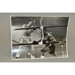 JOHNNY PRESCOTT IN ACTION, the black and white photograph is signed, To Jan, With Best Wishes,