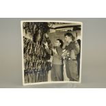 WOLVERHAMPTON WANDERERS TRAINER AND PLAYER IN ARMY UNIFORM, in the boot room at Molineux dated