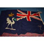 A LATE 19TH CENTURY BRITISH ENSIGN FLAG, blue ground with a bird (liverbird) below a crown, 238cm
