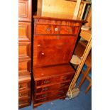 A REPRODUCTION MAHOGANY CABINET with a fall front door with a tooled leather inlay and fitted