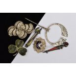 SIX BROOCHES, to include a gem set medieval axe brooch, a three leaf clover, and others, some with