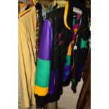 A LOUIS FERAND SET IN LEATHER AND WOOL, consisting of Bomber jacket, size 12 and skirt size 14, a