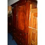 A GEORGIAN MAHOGANY, ROSEWOOD BANDED AND INLAID PANELLED DOUBLE DOOR LINEN PRESS, the top