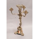 A SILVER PLATED TABLE CENTRE PIECE/CANDELABRUM, lacks glass bowl, foliate scroll decoration,