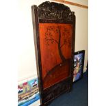 AN ORIENTAL STAINED CARVED OAK FLOOR STANDING TWO FOLD SCREEN with distressed shibayama detail,