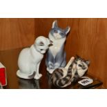 THREE ROYAL COPENHAGEN CATS, Playful Cat No 727, a seated white cat No 499 and seated grey and white