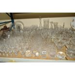 A LARGE QUANTITY OF GLASSWARE, including drinking glasses, sundae dishes, rose bowls, fruit bowls,