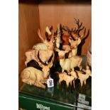 A GROUP OF BESWICK DEER etc, to include Stag, lying No 954 (antler reglued), three Stags, standing