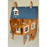 A MODERN THREE STOREY DOLL'S HOUSE AND FURNISHINGS, with blue pitched roof, with brick effect